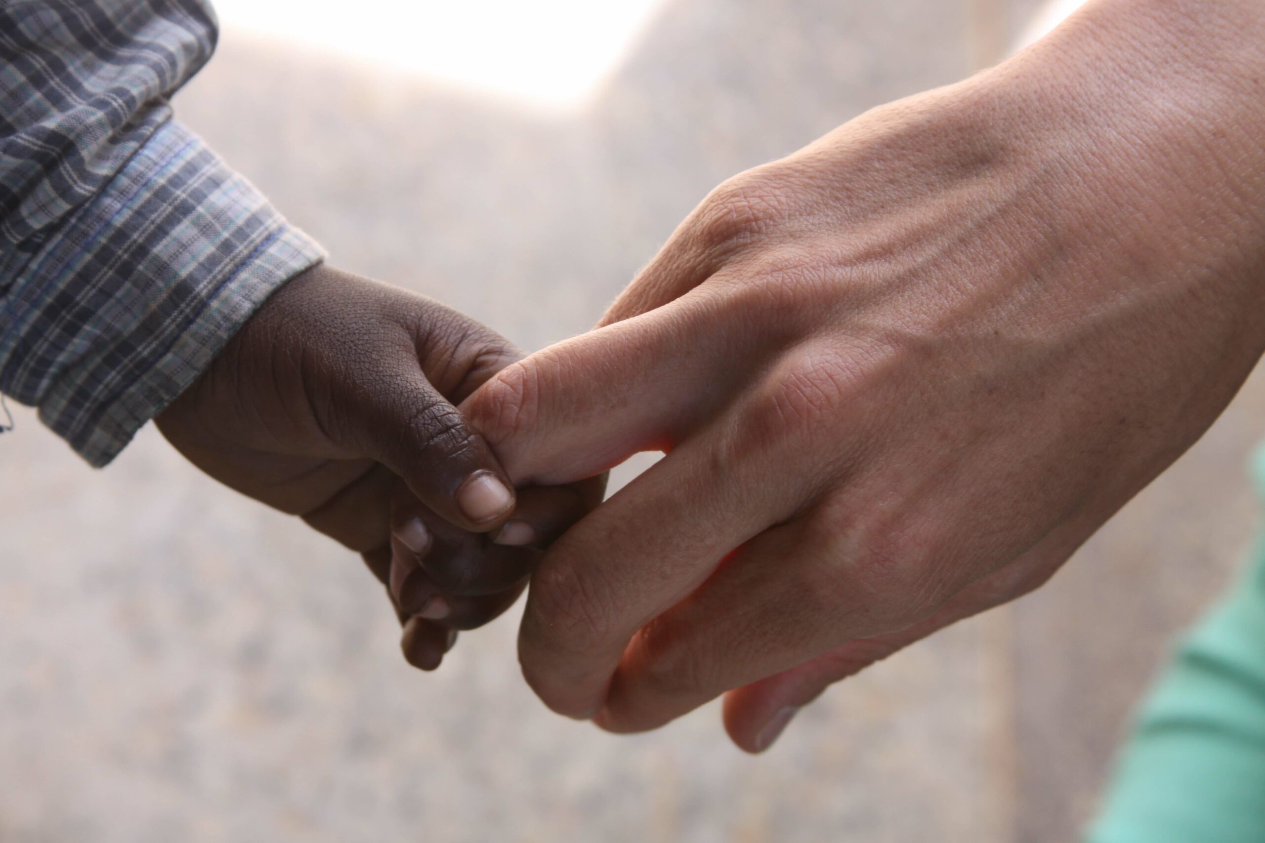 Two hands holding