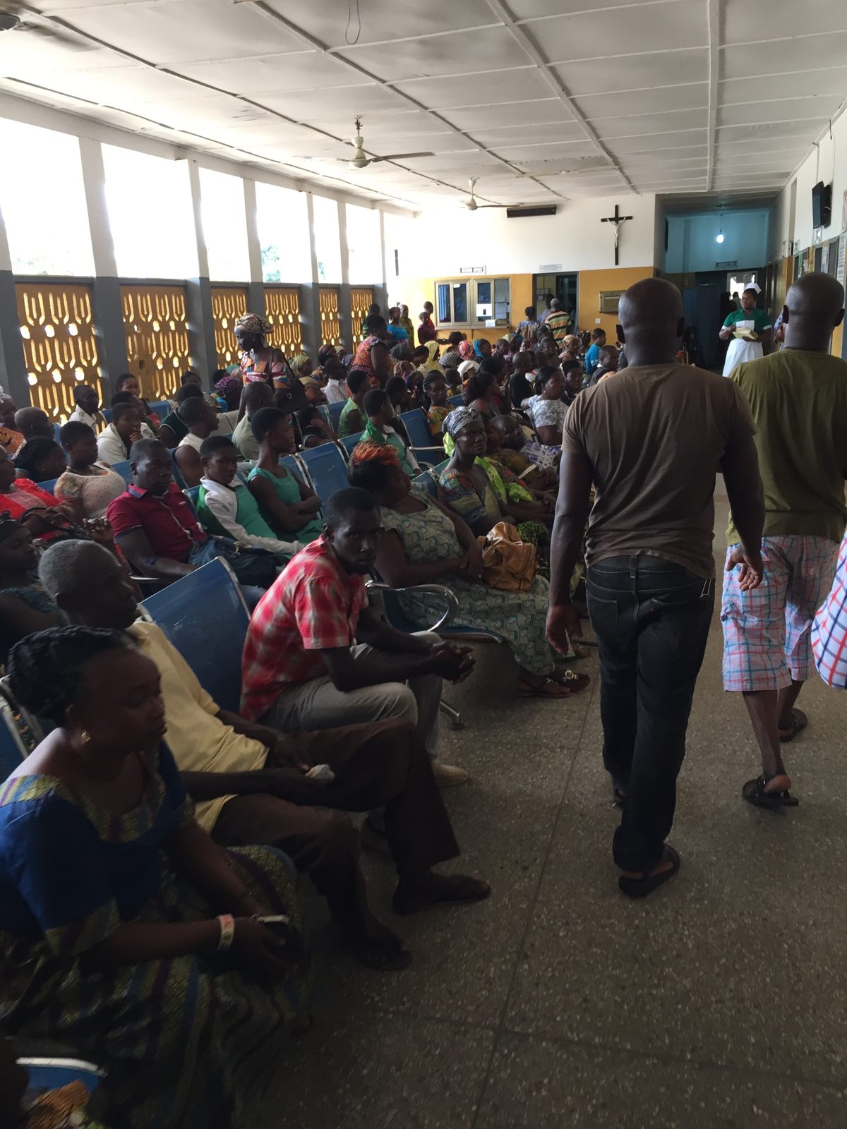 A full clinic waiting hall in the morning