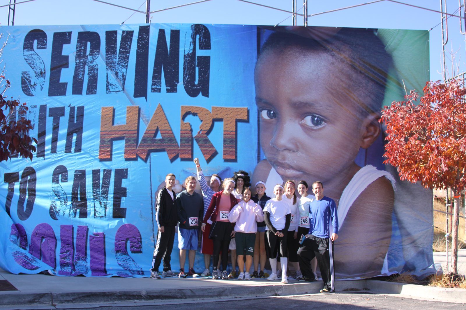 Serving with HART billboard standing in a Utah park